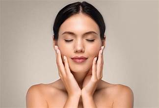 Skincare cream applied on cheek